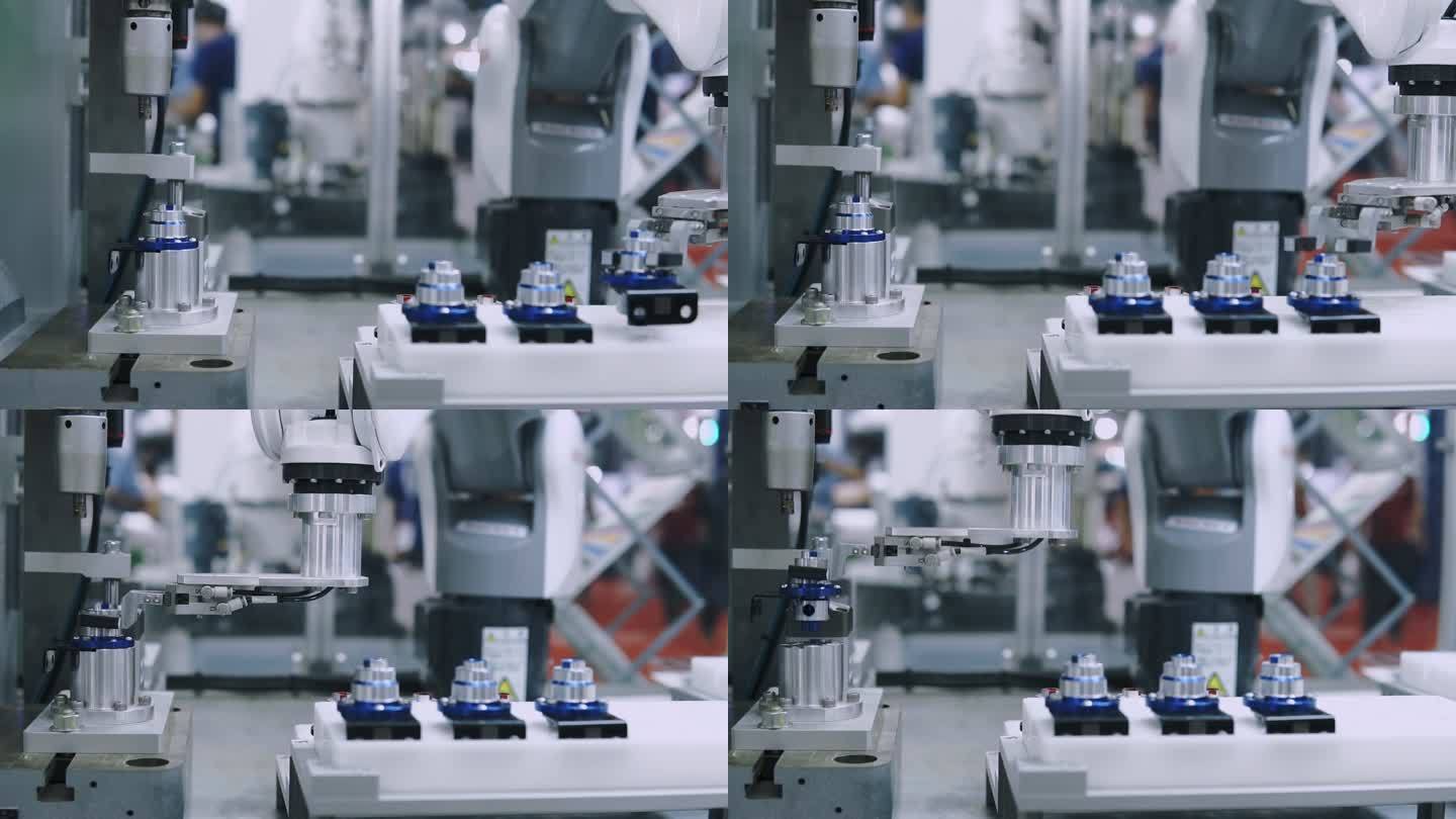 机器人机器制造部件在工厂的工作站上运行。