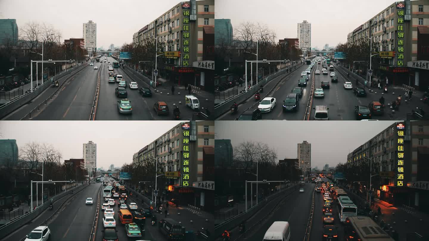 郑州步行街天桥延时摄影车流从白天到黑夜