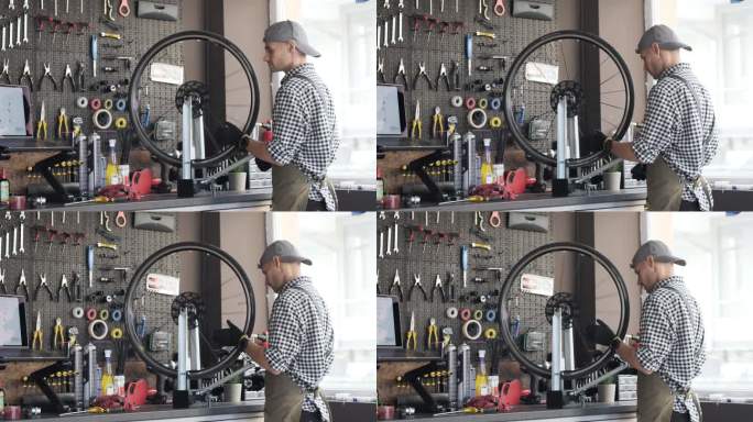 修理厂修理自行车轮胎的技工