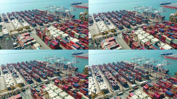 鸟瞰集装箱货船在码头商业港口的工作起重机桥上装载集装箱，用于商业物流、进出口、航运或货运。