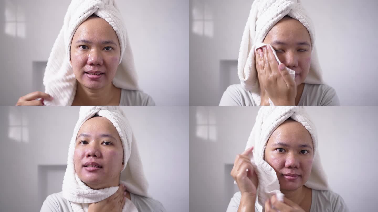 洗脸后用毛巾擦干脸的女人