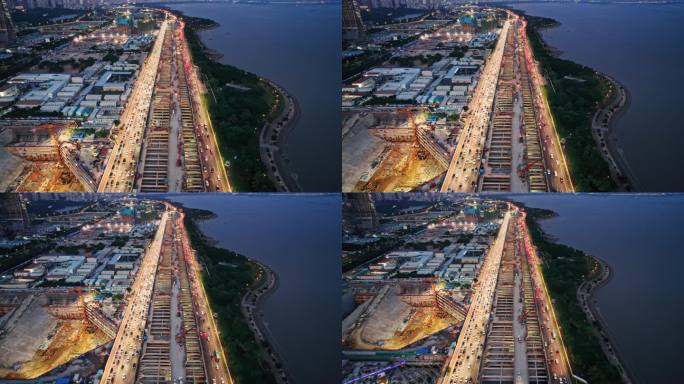 航拍深圳湾超级总部建设傍晚亮灯场景