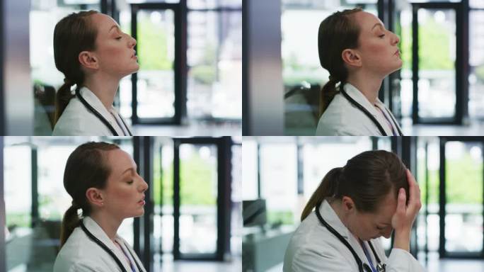 一个漂亮的年轻医生独自站在诊所感到心烦的4k视频片段