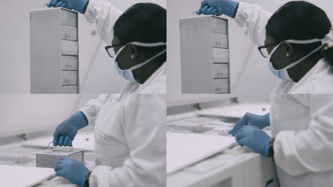 一位年轻科学家在实验室取回冷冻医学样本的4k视频片段