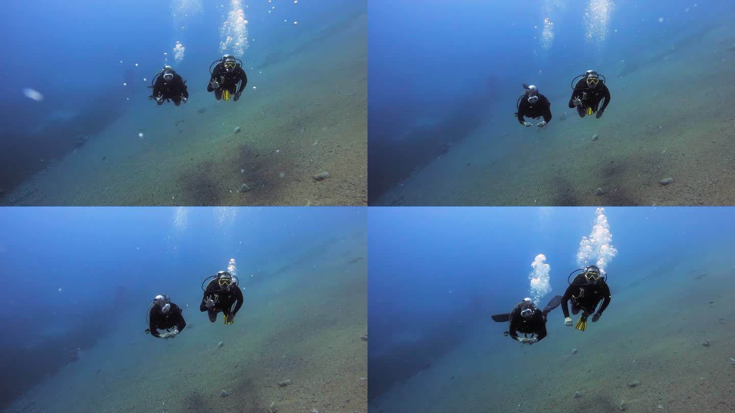 两名男子在海洋中潜水的4k视频片段