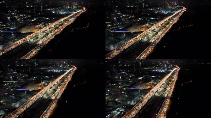航拍深圳湾超级总部建设夜景