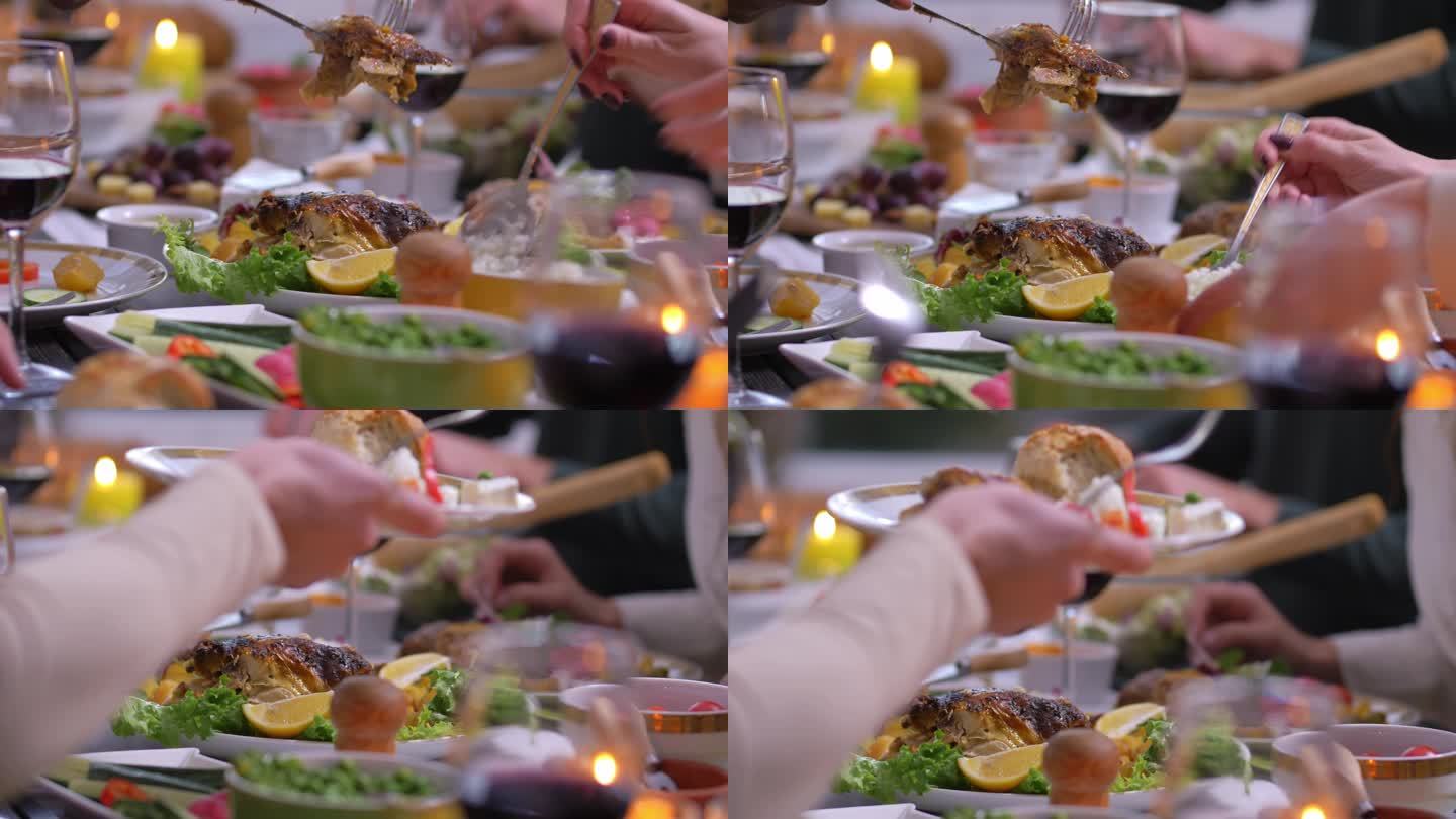 一群朋友在感恩节晚餐时把食物放在盘子里