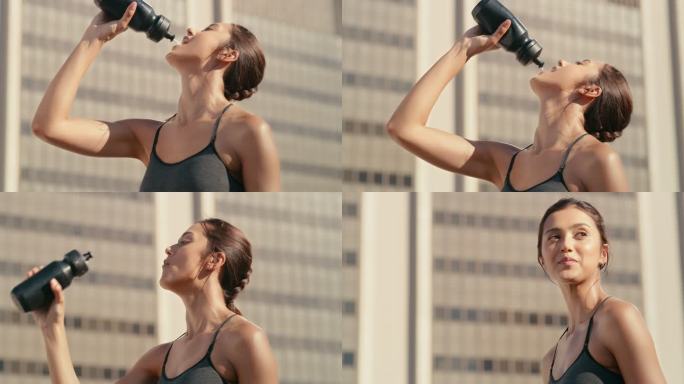 一名妇女外出跑步时饮用水的4k视频片段
