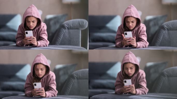 一个愤怒的少女正在使用她的智能手机。
