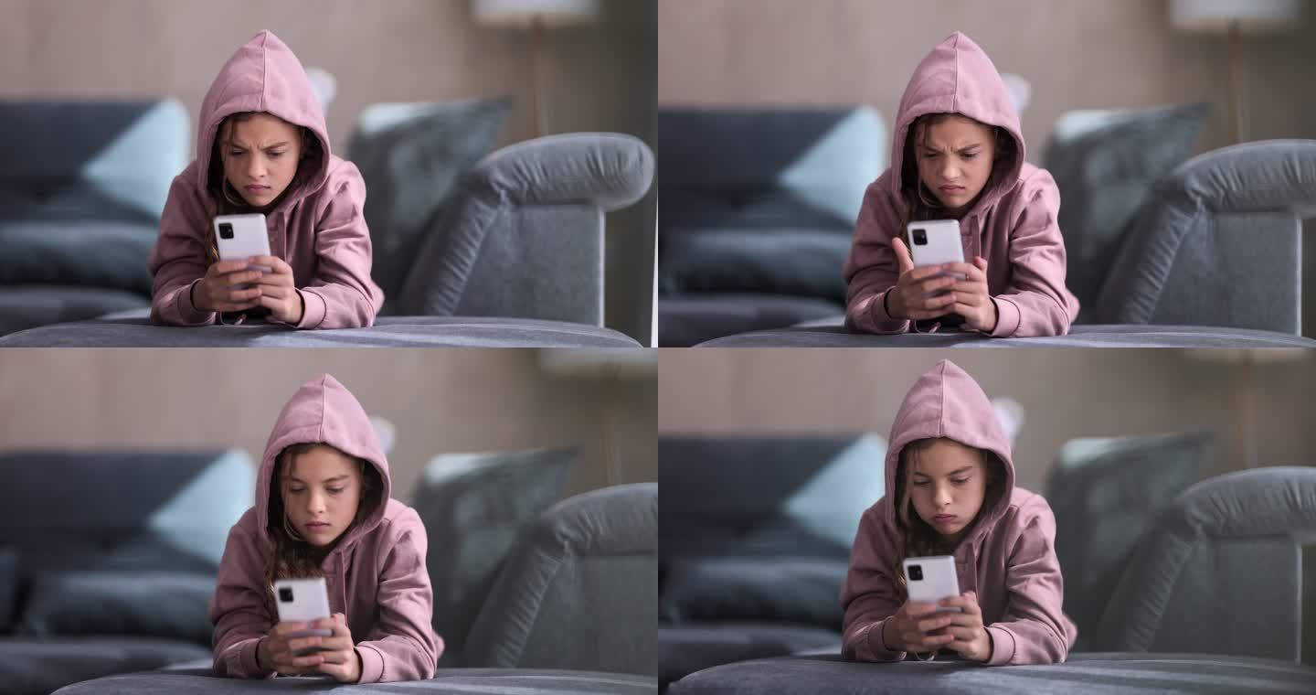 一个愤怒的少女正在使用她的智能手机。