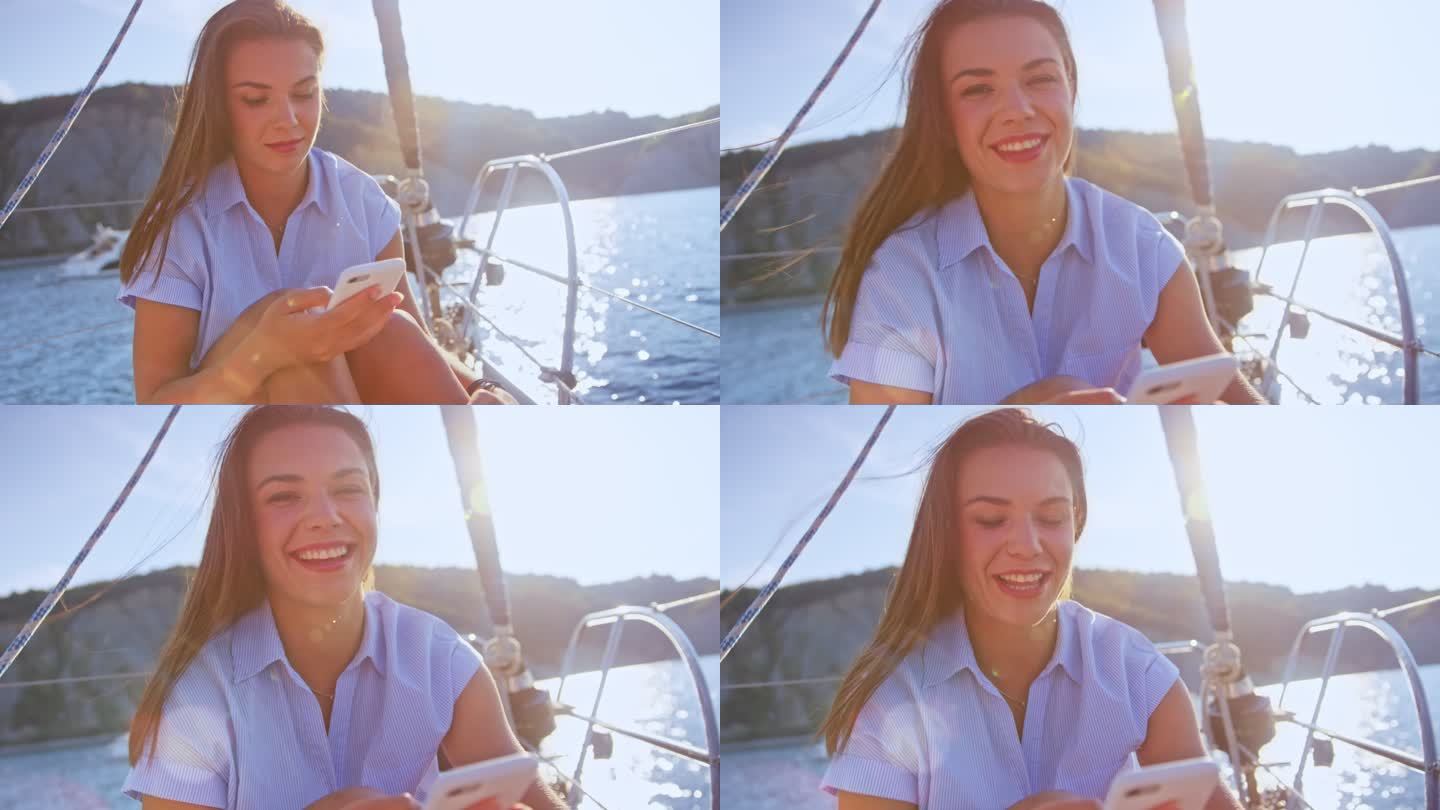 SLO-MO：一位年轻女子在游艇上打电话微笑的肖像