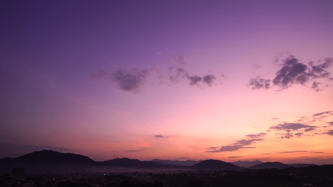 粉色傍晚天空晚霞延时黄昏群山唯美紫霞云朵