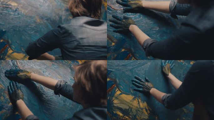 斯洛·莫，一位才华横溢的女艺术家，在画布上用双手画画