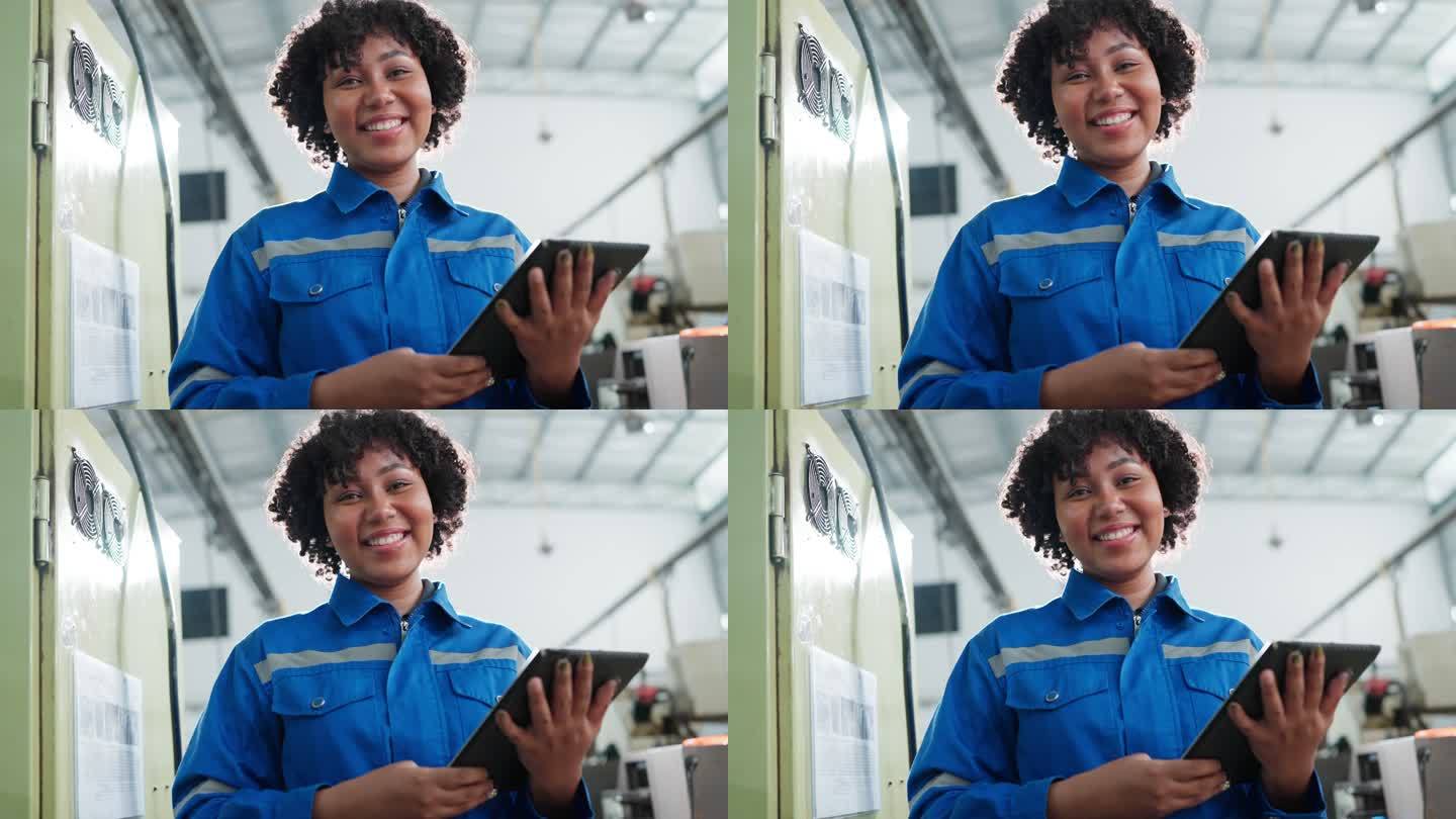 女性非洲裔机械工程师平板电脑控制机操作数控铣床设置流程，女性技术员在金属产品生产线工作
