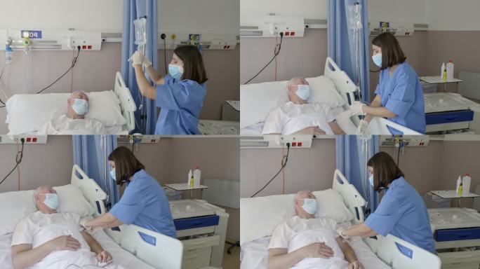 护士将静脉点滴连接到老年患者