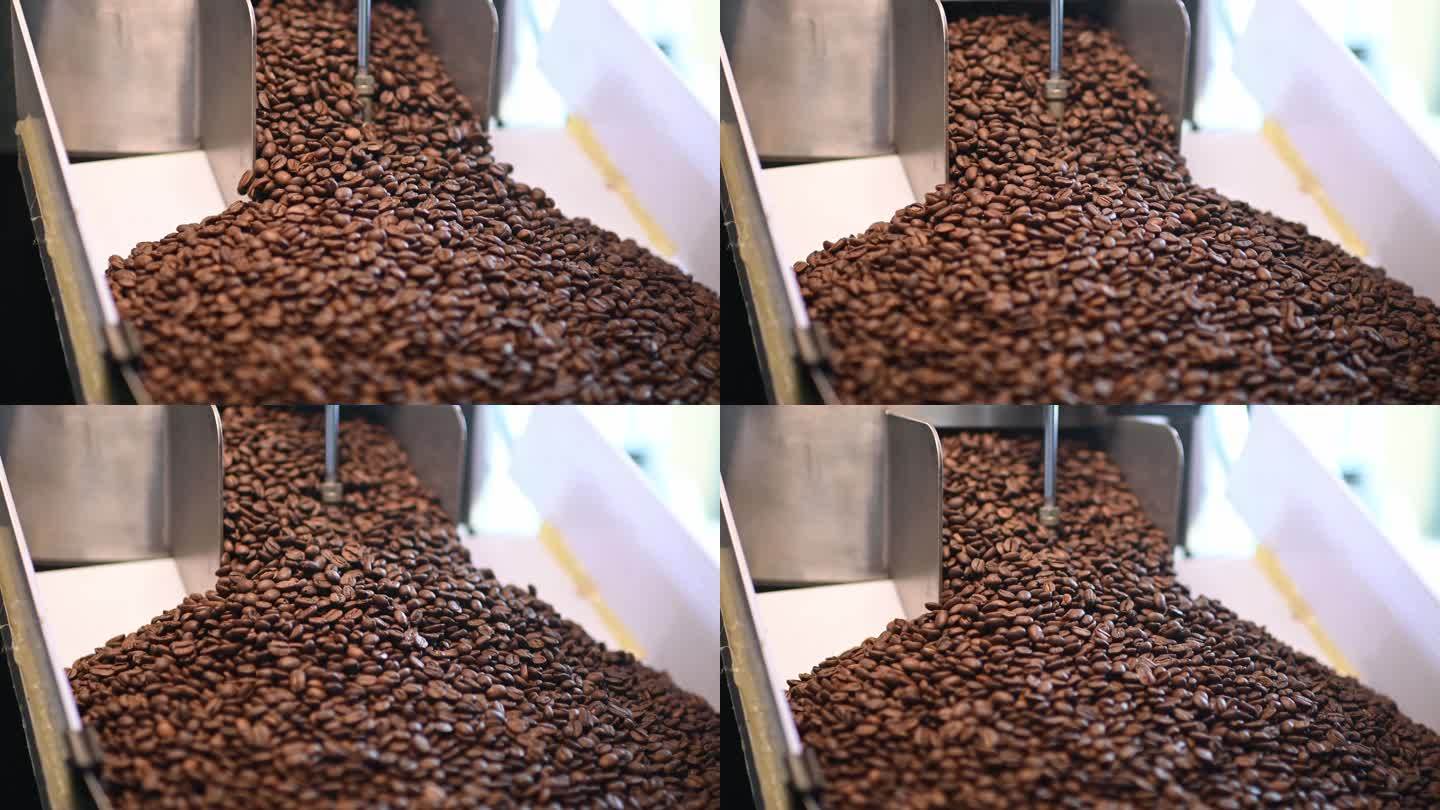 慢动作咖啡烘焙机：将烘焙咖啡豆放入冷却盘中去石的机器