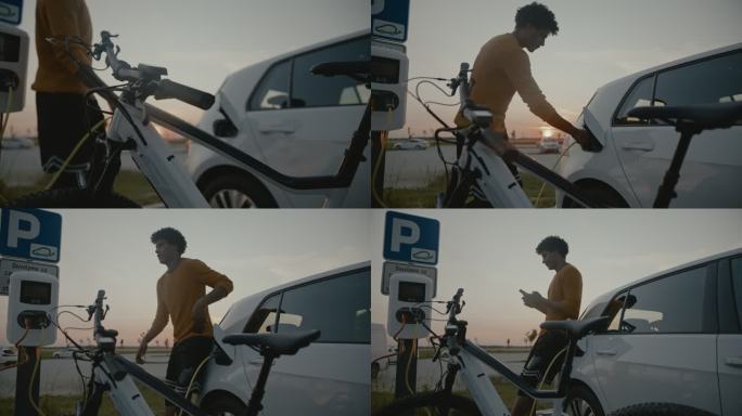SLO MO，一个年轻人，在电动自行车和电动汽车充电站充电时使用手机