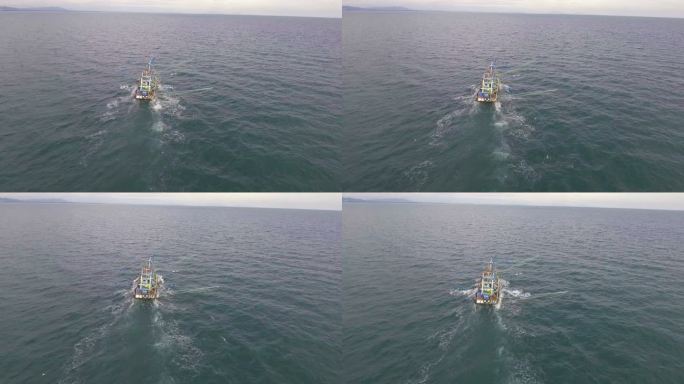 带无人机的海洋拖网渔船。飞近射击。