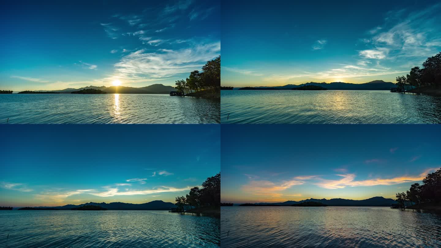 日落时山和湖的宁静场景，从白天到黄昏的延时视频