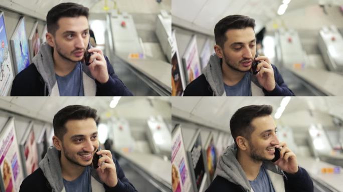 年轻人在地铁自动扶梯里打电话，用智能手机玩游戏，在手机上发短信，手机上浏览社交媒体，用一只手玩游戏，