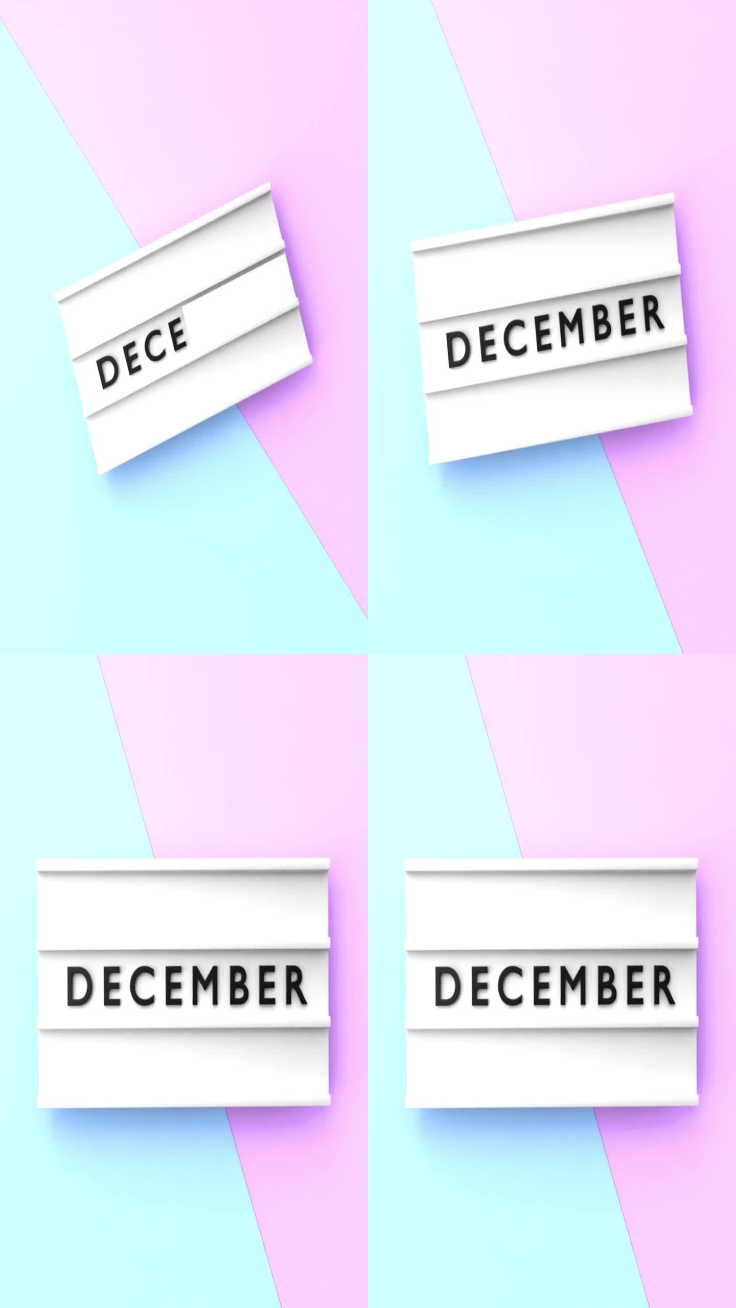 垂直12月文本以4K分辨率显示在蓝色和粉红色背景的灯箱上