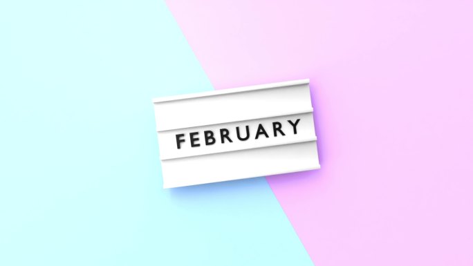 二月文本以4K分辨率显示在蓝色和粉红色背景的灯箱上