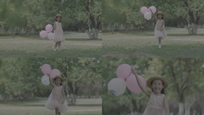 小女孩拉着气球奔跑