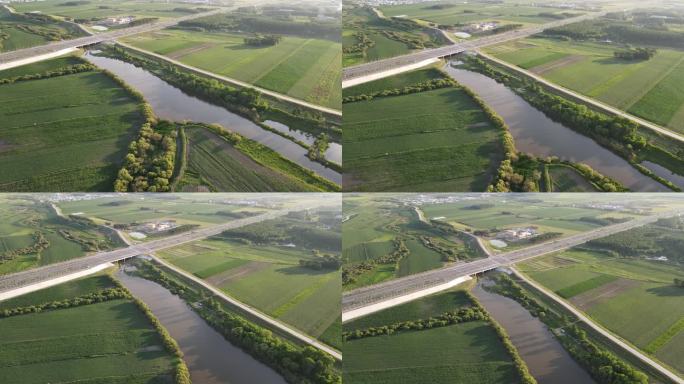 4k航拍俯瞰绿地河流公路