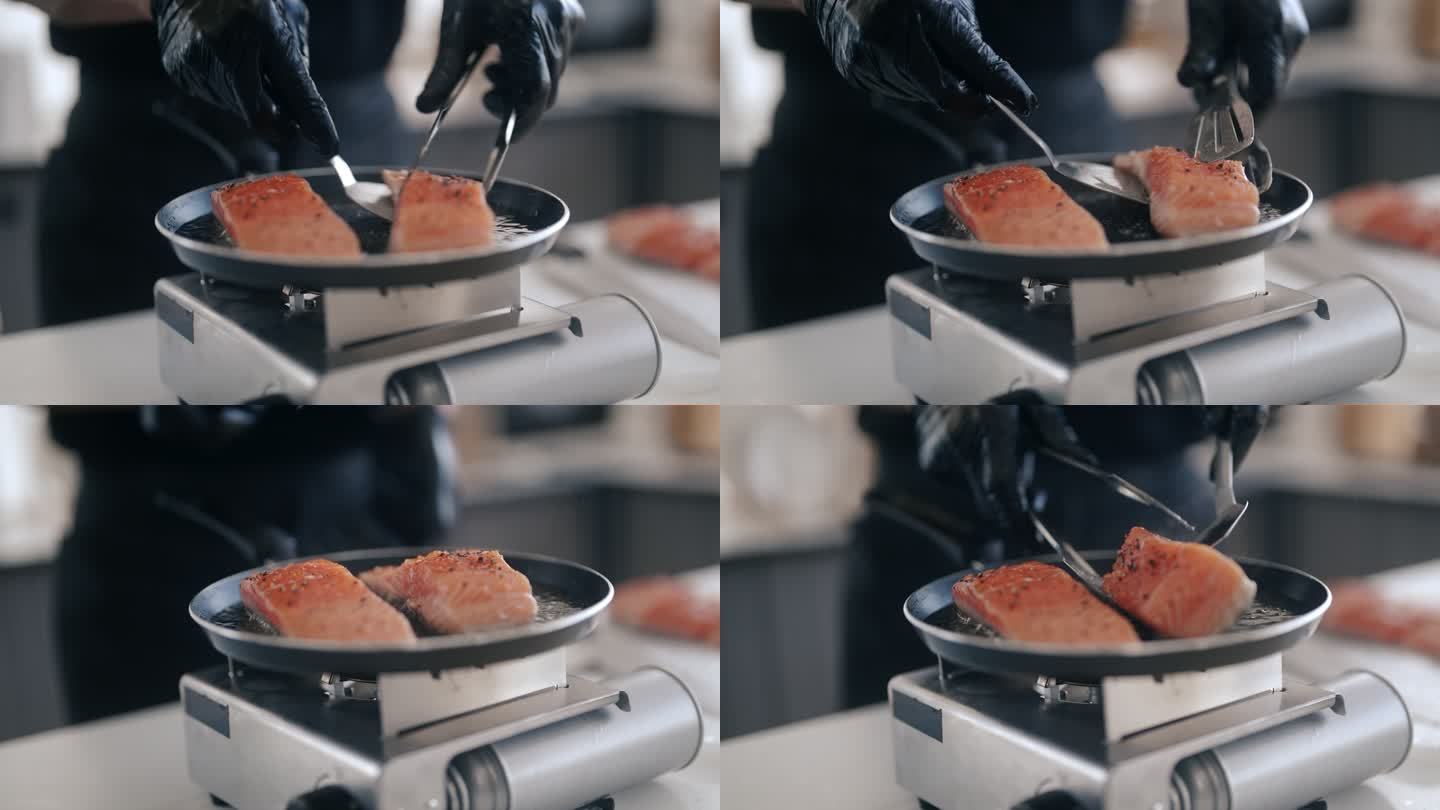 一位日本厨师正在做鲑鱼牛排