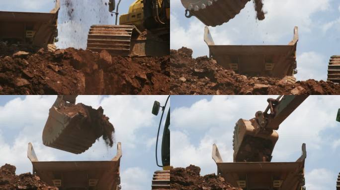 在阳光明媚的建筑工地，挖掘机铲斗挖掘、捡起泥土并将其倒入自卸车后部的慢镜头