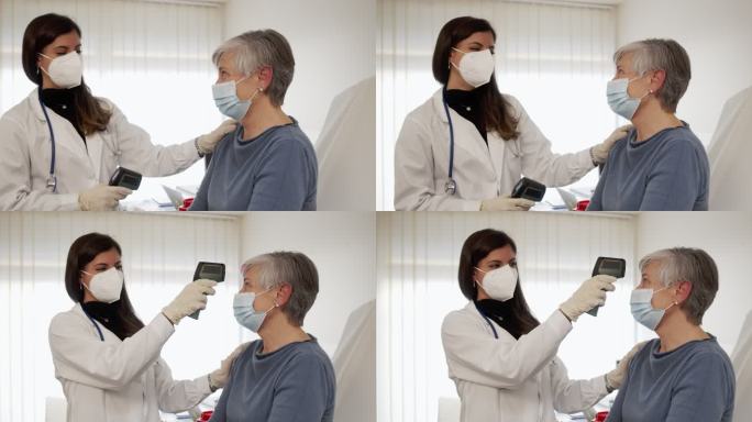一名护士测量一名成熟女性体温的慢动作视频