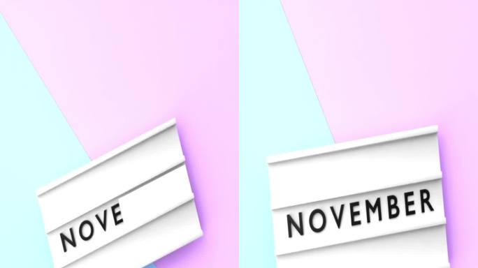 垂直十一月文本以4K分辨率显示在蓝色和粉红色背景的灯箱上