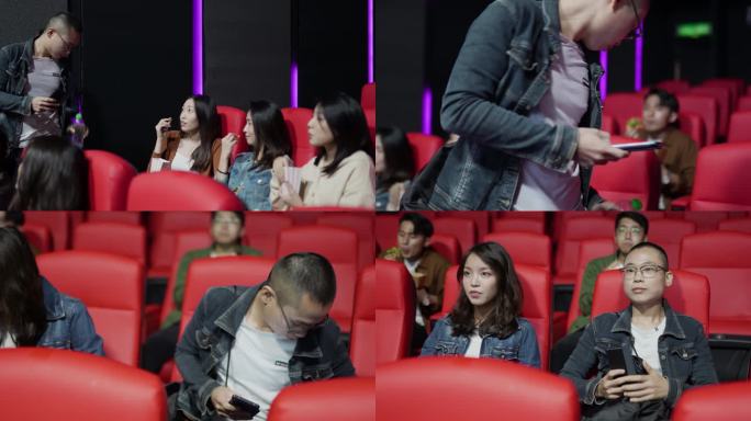 在电影放映时间，一对亚裔华裔夫妇进入电影院大厅，穿过其他观众进入座位