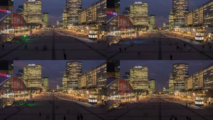 巴黎La Defense商业区天际线和夜间人群的照明视图-4k延时（向上倾斜）