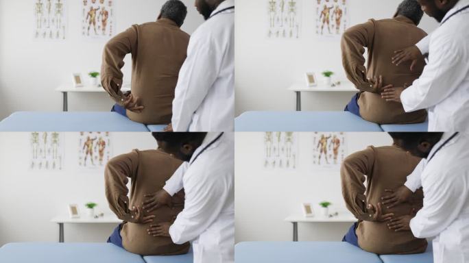 物理治疗师在医生办公室检查老年患者的背部损伤
