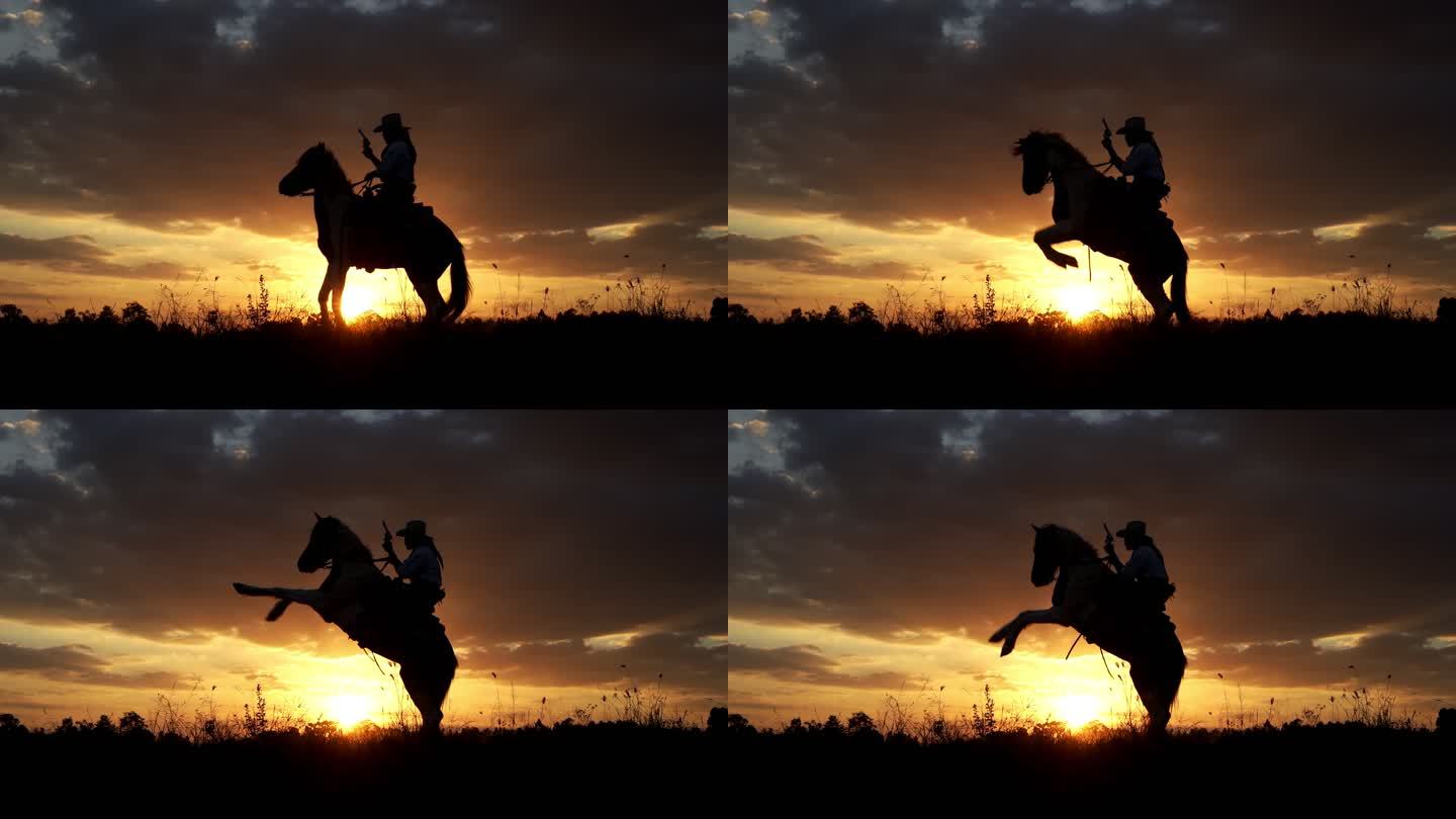 日落时骑着马手持枪的牛仔