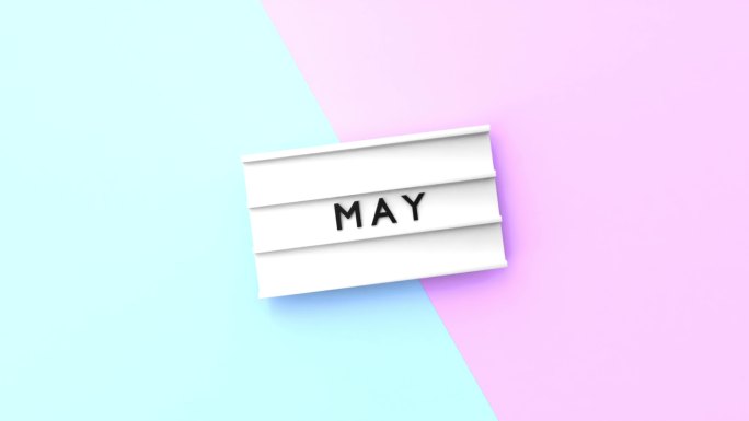 五月文本以4K分辨率显示在蓝色和粉红色背景的灯箱上