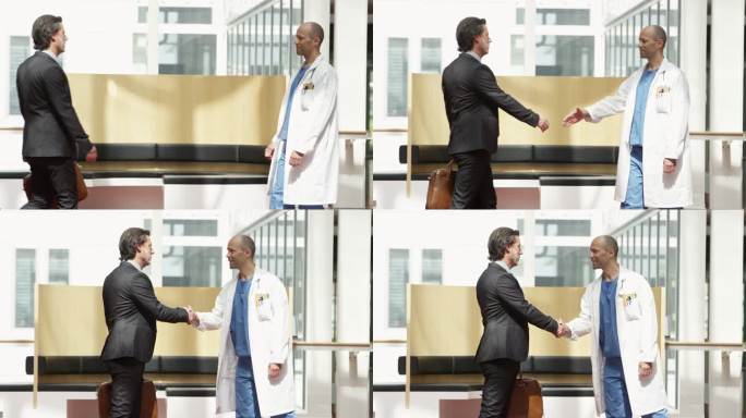商人在医院与医生握手