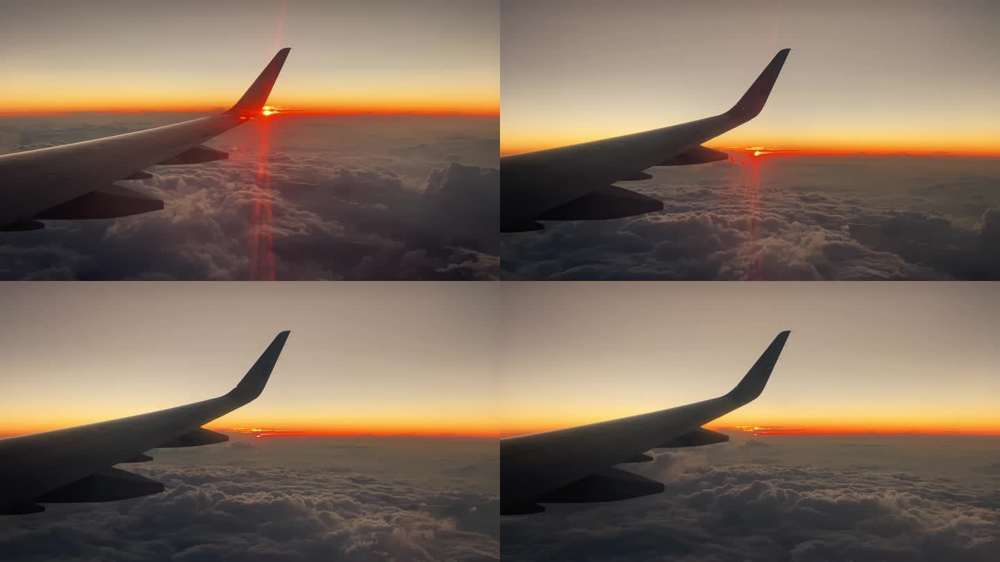 飞机上拍摄日落素材 在飞机上拍窗户外日落