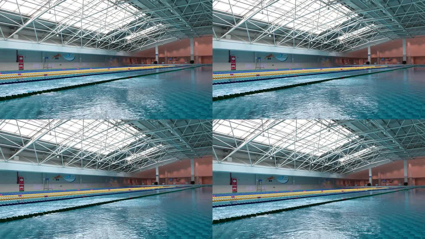 室内游泳馆游泳池内清澈的水市民游泳健身