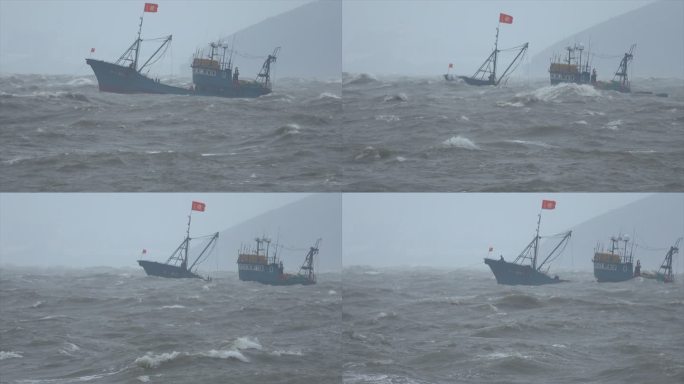 大浪中逆行的渔船 台风天海上航行的渔船
