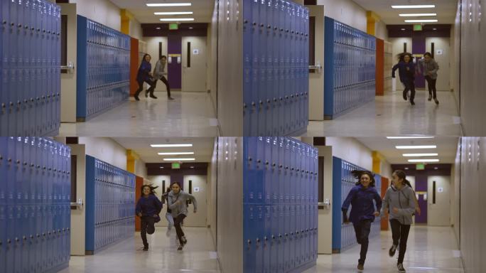 三个中学生和高中生快速穿过学校走廊
