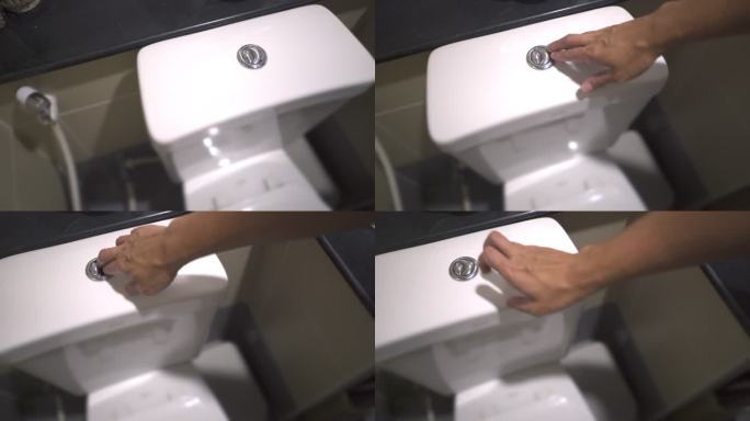 多莉拍摄了一名男子在厕所冲洗水的手