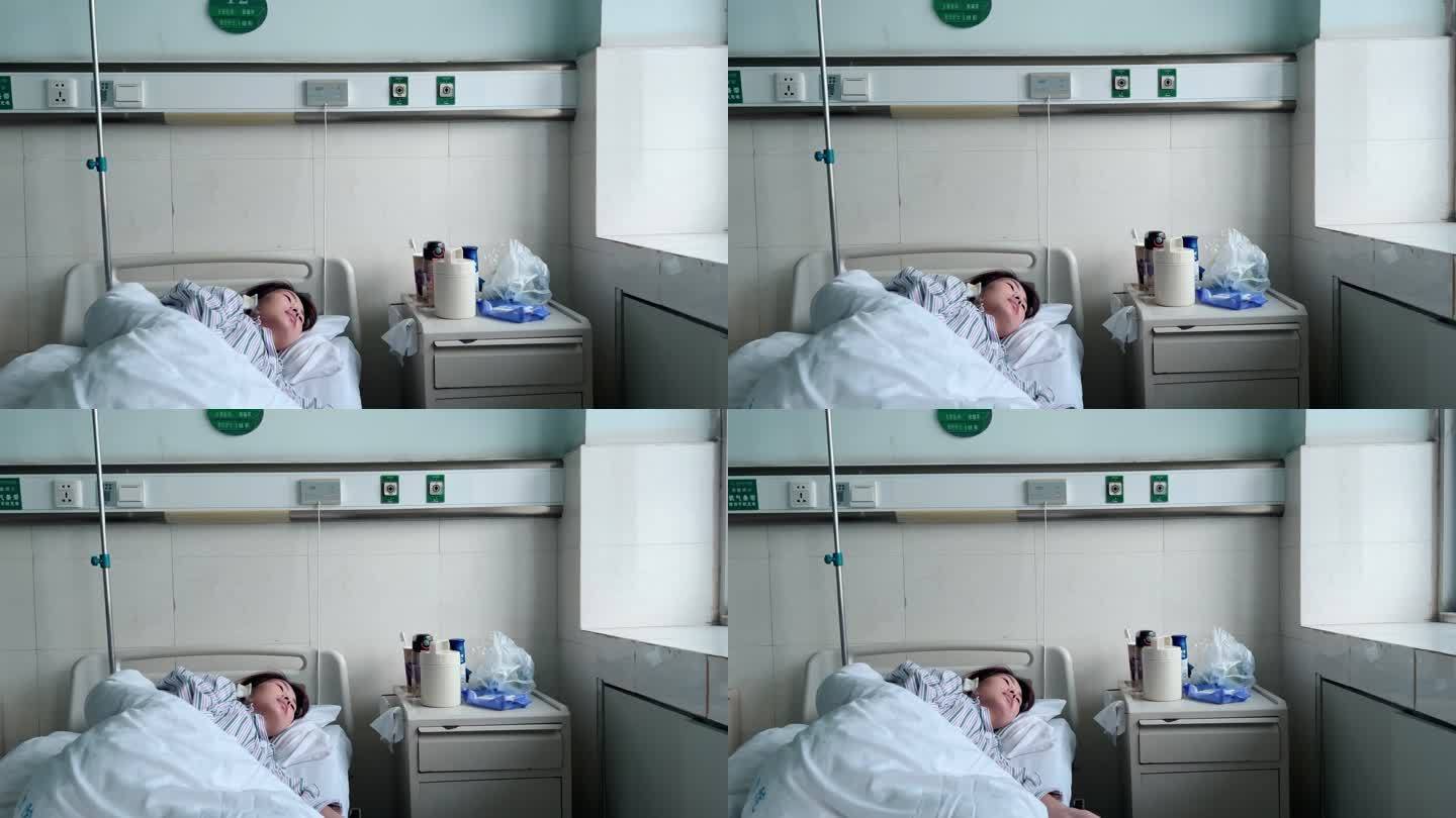 4K一位女性病人在病房病床躺着看窗外