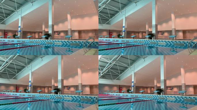 室内游泳馆游泳池内清澈的水市民游泳健身