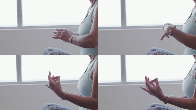 一位年长女性在家做瑜伽的4k视频片段
