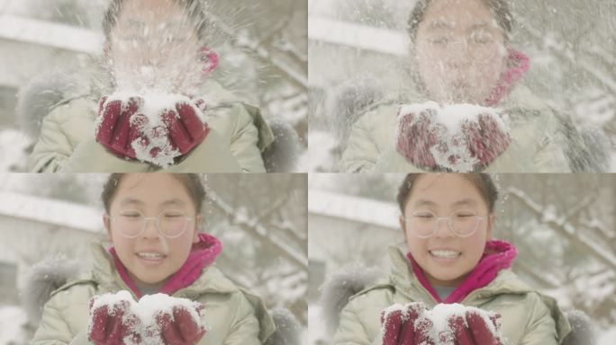 斯洛莫女孩吹雪到空中