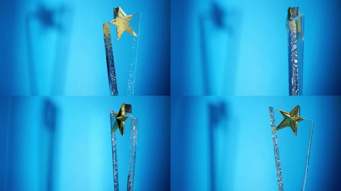 蓝色背景赢得奖杯金色五角星透明材质镶嵌技