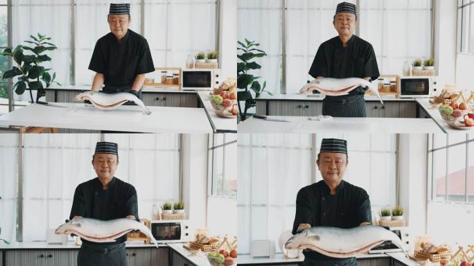 日本厨师肖像民族手捧鱼类展示案板