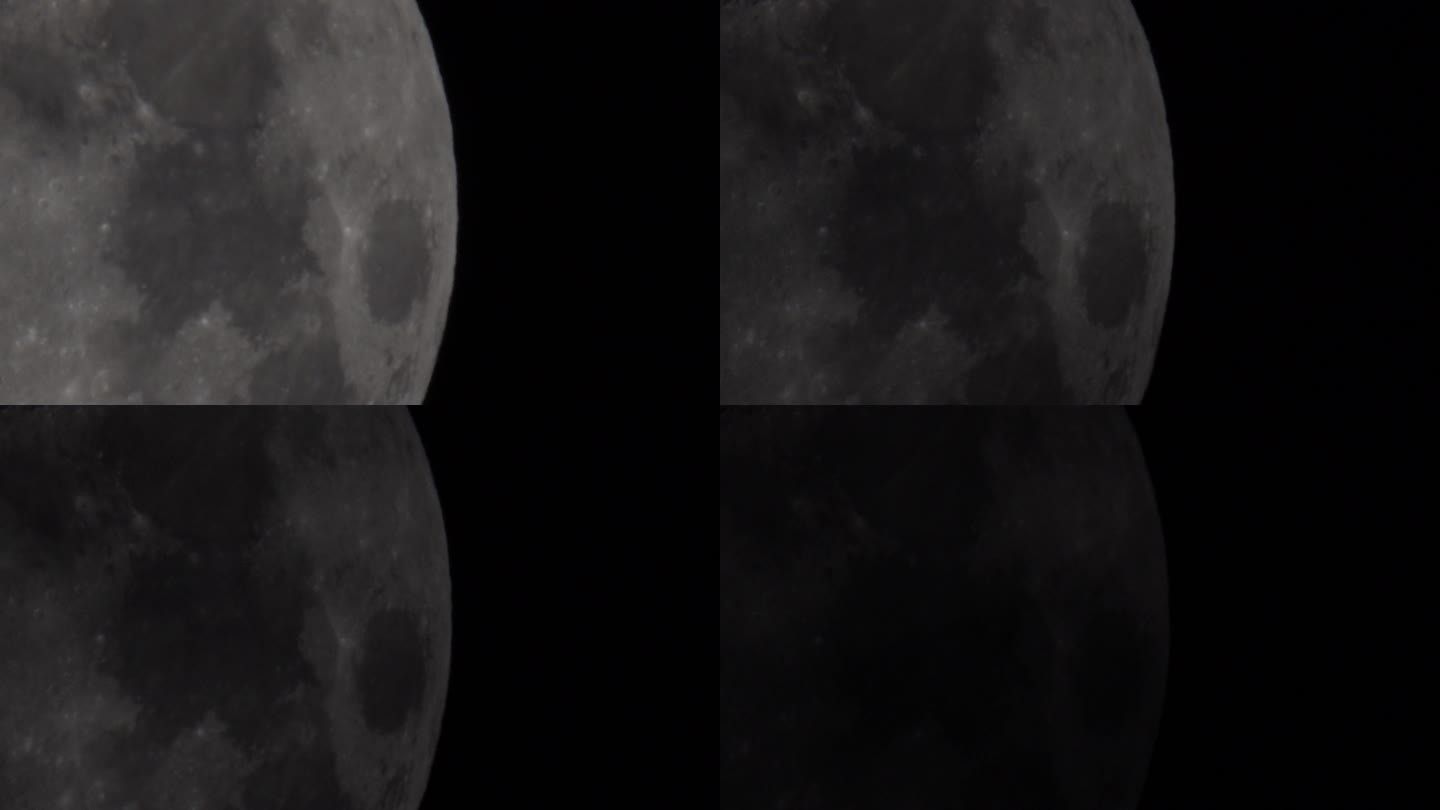 通过望远镜观察黑色夜空中的月亮